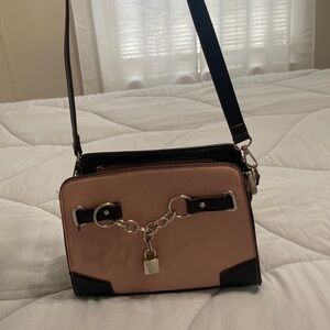 Pink and black purse